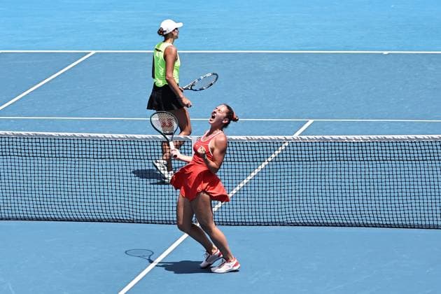 Marta Kostyuk (blonde hair), UKR, and Elena-Gabriela Ruse (red cap), ROU, during womenÂ s doubles at 2025 Australian Open in Melbourne, 19 01 2025; -