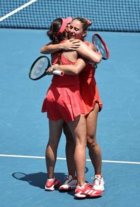 Marta Kostyuk (blonde hair), UKR, and Elena-Gabriela Ruse (red cap), ROU, during womenÂ s doubles at 2025 Australian Open in Melbourne, 19 01 2025; -