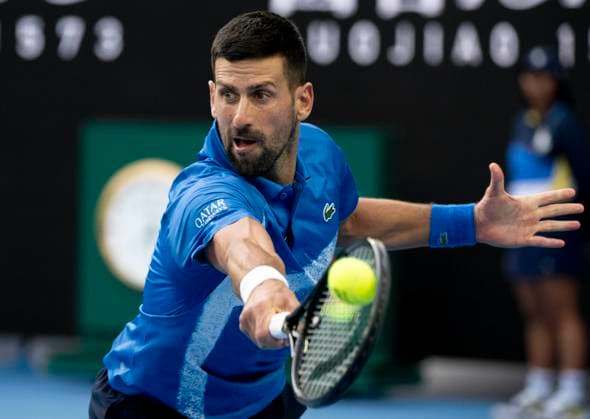 (250119) -- MELBOURNE, Jan. 19, 2025 -- Novak Djokovic hits a return during the men s singles 4th round match between Novak Djokovic of Serbia and Jiri Lehecka of the Czech Republic at Australian Open tennis tournament in Melbourne, Australia, Jan. 19, 2025. ) (SP)AUSTRALIA-MELBOURNE-TENNIS-AUSTRALIAN OPEN-DAY 8 LuixSiuxWai 