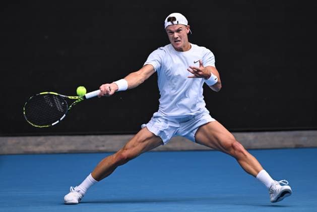 TENNIS AUSTRALIAN OPEN, Holger Rune of Denmark in action during his round 4 match against Jannik Sinner of Italy during the 2025 Australian Open at Melbourne Park in Melbourne, Monday, January 20, 2025. ( NO ARCHIVING, EDITORIAL USE ONLY, NO USE IN BOOKS WITHOUT CONSENT MELBOURNE VICTORIA AUSTRALIA  Copyright: xJAMESxROSSx 20250120196032291556