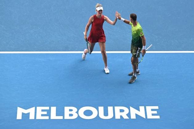 TENNIS AUSTRALIAN OPEN, Michael Venus (right) and Erin Routliffe of New Zealand during their Mixed doubles 1 4 final match against Asia Muhammad of USA and Andres Molteni of Argentina during the 2025 Australian Open at Melbourne Park in Melbourne, Tuesday, January 21, 2025. ( NO ARCHIVING, EDITORIAL USE ONLY, NO USE IN BOOKS WITHOUT CONSENT MELBOURNE VICTORIA AUSTRALIA  Copyright: xLUKASxCOCHx 20250121185233543476