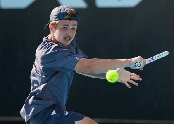 Flynn Thomas (SUI), Jungen Einzel, Boys SinglesAustralian Open 2025, Melbourne Park, Melbourne, Victoria, Australia. Copyright: xJuergenxHasenkopfx