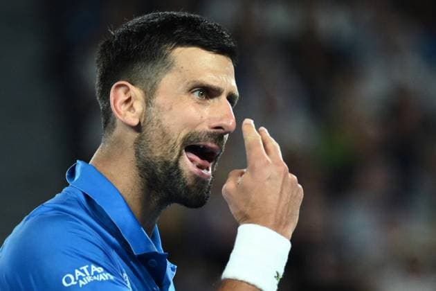 TENNIS AUSTRALIAN OPEN, Novak Djokovic of Serbia reacts during his 1 4 final match against Carlos Alcaraz of Spain during the 2025 Australian Open at Melbourne Park in Melbourne, Tuesday, January 21, 2025. ( NO ARCHIVING, EDITORIAL USE ONLY, NO USE IN BOOKS WITHOUT CONSENT MELBOURNE VICTORIA AUSTRALIA  Copyright: xJOELxCARRETTx 20250121197815789377