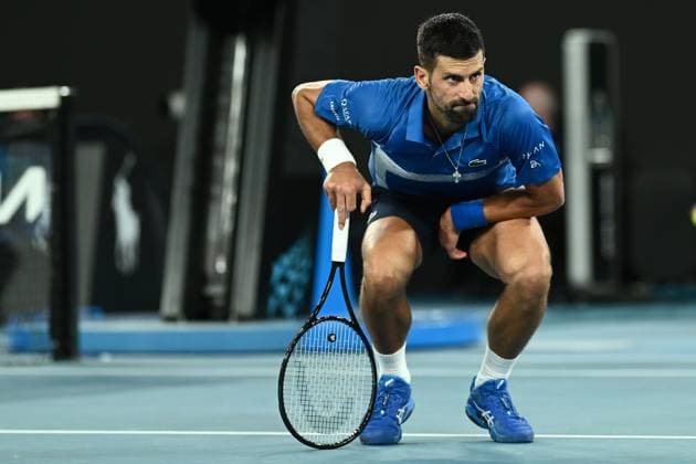 TENNIS AUSTRALIAN OPEN, Novak Djokovic of Serbia reacts during his 1 4 final match against Carlos Alcaraz of Spain during the 2025 Australian Open at Melbourne Park in Melbourne, Tuesday, January 21, 2025. ( NO ARCHIVING, EDITORIAL USE ONLY, NO USE IN BOOKS WITHOUT CONSENT MELBOURNE VICTORIA AUSTRALIA  Copyright: xJOELxCARRETTx 20250121164702951214