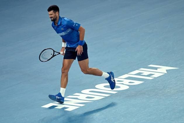 TENNIS AUSTRALIAN OPEN, Novak Djokovic of Serbia reacts during his 1 4 final match against Carlos Alcaraz of Spain during the 2025 Australian Open at Melbourne Park in Melbourne, Tuesday, January 21, 2025. NO ARCHIVING, EDITORIAL USE ONLY, NO USE IN BOOKS WITHOUT CONSENT MELBOURNE VICTORIA AUSTRALIA  Copyright: xLUKASxCOCHx 20250121134677622393