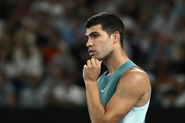 TENNIS AUSTRALIAN OPEN, Carlos Alcaraz of Spain reacts during his 1 4 final match against Novak Djokovic of Serbia during the 2025 Australian Open at Melbourne Park in Melbourne, Tuesday, January 21, 2025. ( NO ARCHIVING, EDITORIAL USE ONLY, NO USE IN BOOKS WITHOUT CONSENT MELBOURNE VICTORIA AUSTRALIA  Copyright: xJOELxCARRETTx 20250121192627062108