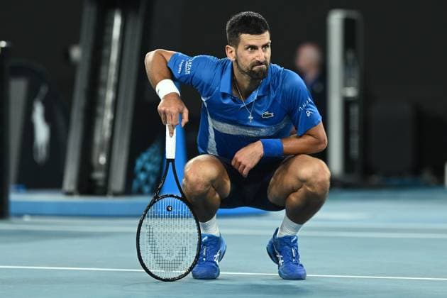 TENNIS AUSTRALIAN OPEN, Novak Djokovic of Serbia reacts during his 1 4 final match against Carlos Alcaraz of Spain during the 2025 Australian Open at Melbourne Park in Melbourne, Tuesday, January 21, 2025. ( NO ARCHIVING, EDITORIAL USE ONLY, NO USE IN BOOKS WITHOUT CONSENT MELBOURNE VICTORIA AUSTRALIA  Copyright: xJOELxCARRETTx 20250121142751572549