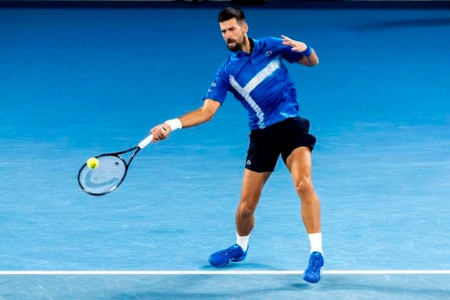 MELBOURNE, VIC - JANUARY 21: Novak Djokovic of Serbia in action during the Quarterfinals of the 2025 Australian Open on January 21 2025, at Melbourne Park in Melbourne, Australia. (Photo by Jason Heidrich Icon Sportswire) TENNIS: JAN 21 Australian Open EDITORIAL USE ONLY Icon250121225