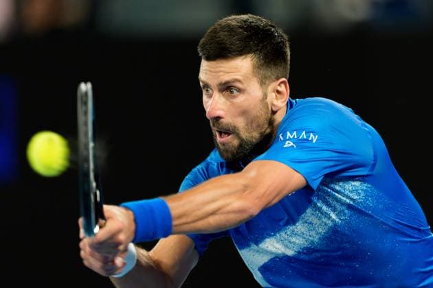 January 21, 2025: 7th seed NOVAK DJOKOVIC of Serbia in action against 3rd seed CARLOS ALCARAZ of Spain on Rod Laver Arena in a Men s Singles Quarterfinals match on day 11 of the 2025 Australian Open in Melbourne, Australia. Cal Media Melbourne Australia - ZUMAc04_ 20250121_faf_c04_011 Copyright: xSydneyxLowx