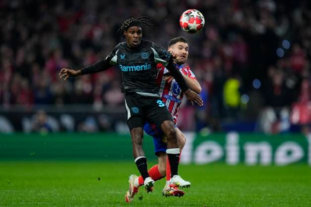 Champions League 2024 25 League match between Atletico de Madrid and Bayer Leverkusen Jeremie Frimpong of Bayer Leverkusen and Javier Galan of Atletico de Madrid during the UEFA Champions League 2024 25 League match between Atletico de Madrid and Bayer Leverkusen at Riyadh Air Metropolitano on December 11, 2024 in Madrid, Spain MadridSpain  Copyright: xx