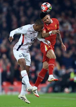 Liverpool, England, 21st January 2025. Liverpool™s Luis Diaz with Lille™s Bafode Diakite during the UEFA Champions League match at Anfield, Liverpool. Picture credit should read: Jessica Hornby Sportimage EDITORIAL USE ONLY. No use with unauthorised audio, video, data, fixture lists, club league logos or live services. Online in-match use limited to 120 images, no video emulation. No use in betting, games or single club league player publications. SPI_025_JH_Liverpool_Lille SPI-3613-0024