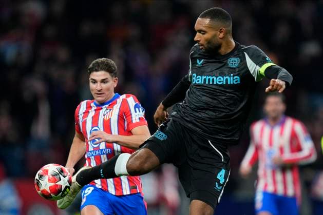 Champions League 2024 25 League match between Atletico de Madrid and Bayer Leverkusen Jonathan Tah of Bayer Leverkusen and Julian Alvarez of Atletico de Madrid during the UEFA Champions League 2024 25 League match between Atletico de Madrid and Bayer Leverkusen at Riyadh Air Metropolitano on December 11, 2024 in Madrid, Spain MadridSpain  Copyright: xx