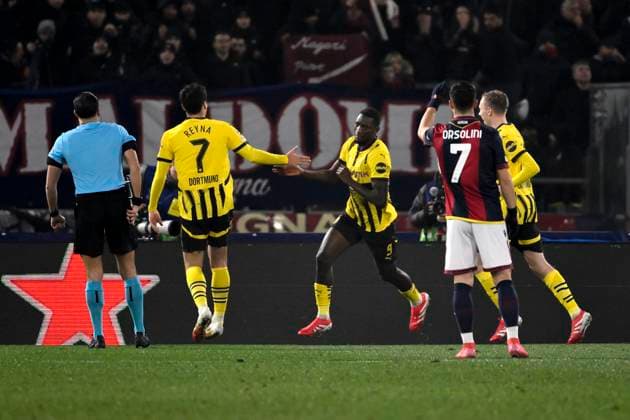 Serhou Guirassy of Borussia Dortmund celebrates with teammates after scoring the goal of 0-1 during the Champions League football match between Bologna FC and Borussia Dortmund at Renato Dall Ara stadium in Bologna (Italy), January 21, 2025. andreaxstaccioli