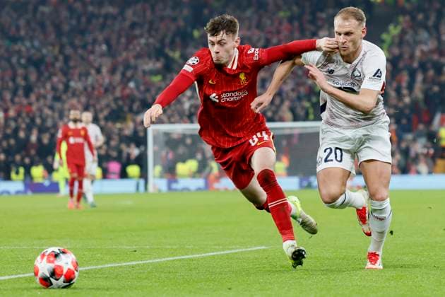 Liverpool FC v LOSC Lille - UEFA Champions League 2024 25 League Phase MD7 Conor Bradley of Liverpool and Mitchel Bakker of LOSC Lille challenge during the UEFA Champions League 2024 25 League Phase MD7 match between Liverpool FC and LOSC Lille at Anfield on January 21, 2025 in Liverpool, England. Liverpool Anfield England United Kingdom Copyright: xRichardxSellers Sportsphoto APLx 14057455