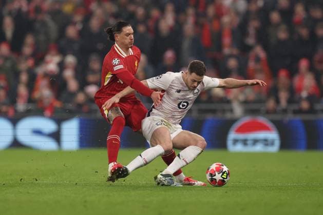 Darwin Nunez of Liverpool and Gabriel Gudmundsson of Lille Liverpool v Lille, UEFA Champions League, Group Stage, Football, Anfield, Liverpool, UK - 21 Jan 2025 EDITORIAL USE ONLY No use with unauthorised audio, video, data, fixture lists, club league logos or live services. Online in-match use limited to 120 images, no video emulation. No use in betting, games or single club league player publications. Copyright: xPaulxCurrie Shutterstockx 15108882aa
