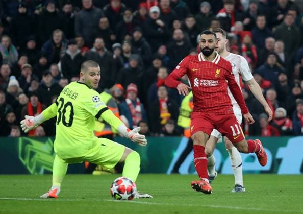 Liverpool, England, 21st January 2025. Liverpool™s Mohamed Salah puts a shot wide during the UEFA Champions League match at Anfield, Liverpool. Picture credit should read: Jessica Hornby Sportimage EDITORIAL USE ONLY. No use with unauthorised audio, video, data, fixture lists, club league logos or live services. Online in-match use limited to 120 images, no video emulation. No use in betting, games or single club league player publications. SPI_055_JH_Liverpool_Lille SPI-3613-0047