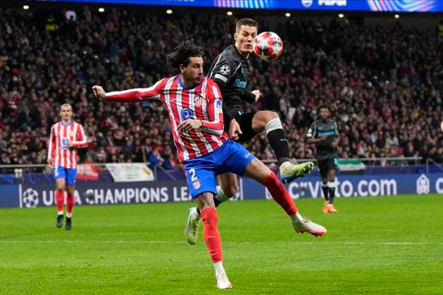 Champions League 2024 25 League match between Atletico de Madrid and Bayer Leverkusen Patrik Schick of Bayer Leverkusen and Jose Gimenez of Atletico de Madrid during the UEFA Champions League 2024 25 League match between Atletico de Madrid and Bayer Leverkusen at Riyadh Air Metropolitano on December 11, 2024 in Madrid, Spain MadridSpain  Copyright: xx