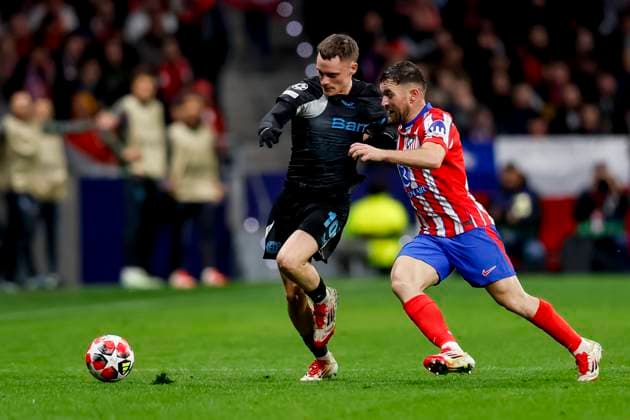 Florian Wirtz (Bayer 04 Leverkusen) und Javi Galan (Atletico Madrid) battle for the ball during the UEFA Champions League 2024 25 League Phase MD7 match between Atletico de Madrid and Bayer 04 Leverkusen at Estadio Civitas Metropolitano on January 21, 2025 in Madrid, Spain. (Photo by Manu Reino DeFodi Images) Defodi-071_ATMLEV20250121_091