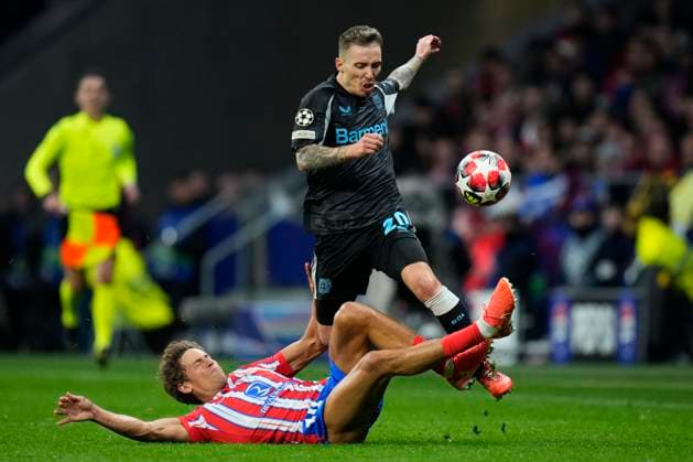 Champions League 2024 25 League match between Atletico de Madrid and Bayer Leverkusen Alejandro Grimaldo of Bayer Leverkusen and Marcos Llorente of Atletico de Madrid during the UEFA Champions League 2024 25 League match between Atletico de Madrid and Bayer Leverkusen at Riyadh Air Metropolitano on December 11, 2024 in Madrid, Spain MadridSpain  Copyright: xx