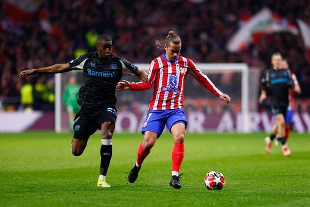 January 21, 2025, Madrid, Madrid, SPAIN: Antoine Griezmann of Atletico de Madrid and Nordi Mukiele of Bayer Leverkusen in action during the UEFA Champions League 2024 25 League Phase MD7 match between Atletico de Madrid and Bayer 04 Leverkusen at Riyadh Air Metropolitano stadium on January 21, 2025, in Madrid, Spain. Madrid SPAIN - ZUMAa181 20250121_zaa_a181_183 Copyright: xDennisxAgyemanx