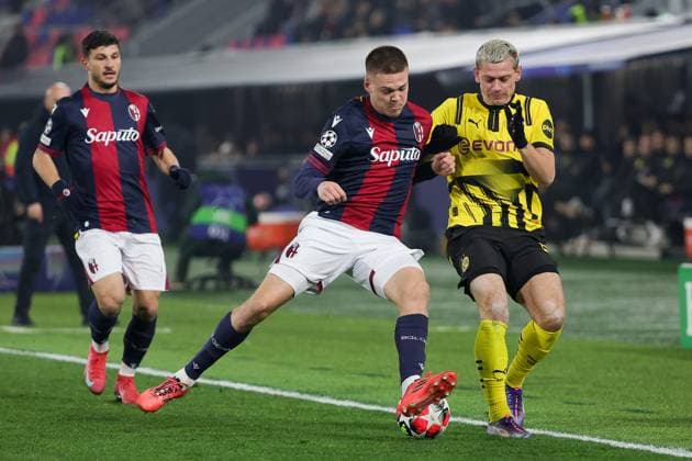 January 21, 2025, Bologna, Italy: (L-R) Emil Holm of Bologna FC and Julian Ryerson of Borussia Dortmund in action during the Italian Serie A soccer match Bologna FC vs Borussia Dortmund at Renato dall Ara Stadium. Final score; Bologna FC 2 - 1 Borussia Dortmund Bologna Italy - ZUMAs197 20250121_aaa_s197_307 Copyright: xEmanuelexPennacchiox