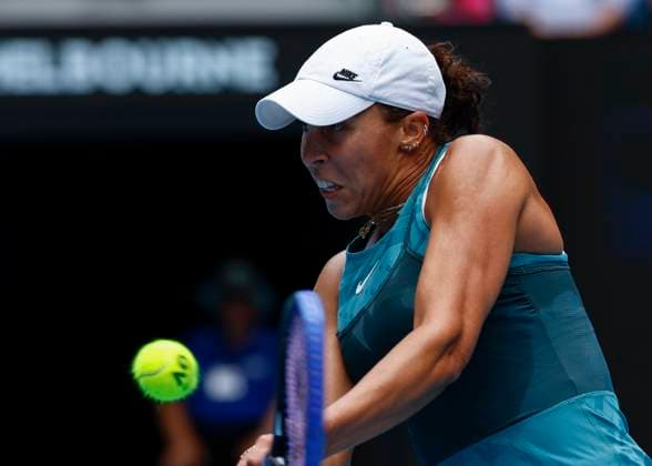 (250122) -- MELBOURNE, Jan. 22, 2025 -- Madison Keys hits a return during the women s singles quarterfinals match between Madison Keys of the United States and Elina Svitolina of Ukraine at the Australian Open tennis tournament in Melbourne, Australia, Jan. 22, 2025. (Photo by Xinhua) (SP)AUSTRALIA-MELBOURNE-TENNIS-AUSTRALIAN OPEN-DAY 11 ChuxChen 