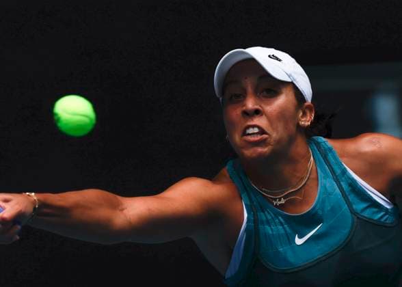 (250122) -- MELBOURNE, Jan. 22, 2025 -- Madison Keys hits a return during the women s singles quarterfinals match between Madison Keys of the United States and Elina Svitolina of Ukraine at the Australian Open tennis tournament in Melbourne, Australia, Jan. 22, 2025. (Photo by Xinhua) (SP)AUSTRALIA-MELBOURNE-TENNIS-AUSTRALIAN OPEN-DAY 11 ChuxChen 