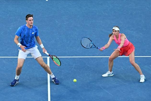 TENNIS AUSTRALIAN OPEN, Olivia Nicholls and Henry Patten of the United Kingdom in action during their mixed doubles final against Kimberley Birrell and John-Patrick Smith of Australia during the 2025 Australian Open at Melbourne Park in Melbourne, Wednesday, January 22, 2025. ( NO ARCHIVING, EDITORIAL USE ONLY, NO USE IN BOOKS WITHOUT CONSENT MELBOURNE VICTORIA AUSTRALIA  Copyright: xJAMESxROSSx 20250122124347364100