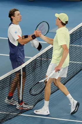 Jannik Sinner meets Alex de Minaur at the net after winning his Quarter-final match in the Rod Laver Arena Australian Open, Day Eleven, Tennis, Melbourne Park, Melbourne, Australia - 22 Jan 2025  Copyright: xRachelxBach Shutterstockx 15108798gf