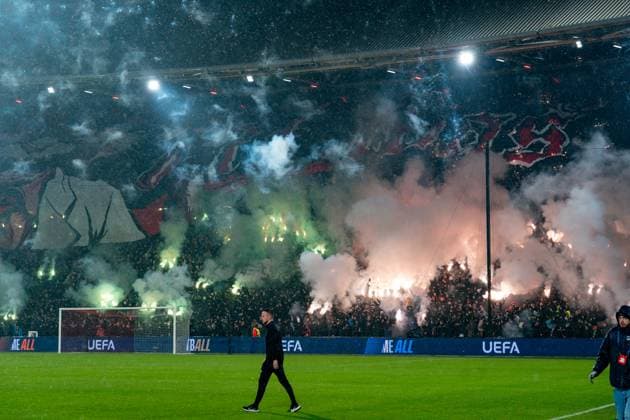 2025-01-22 Feyenoord v FC Bayern Munchen - Champions League - League phase - Matchday 7 ROTTERDAM, NETHERLANDS - JANUARY 22: fans of Feyenoord with a large banner and fireworks during the Champions League - League phase - Matchday 7 match between Feyenoord and FC Bayern Munchen at Stadion Feijenoord on January 22, 2025 in Rotterdam, Netherlands. Rotterdam Stadion Feijenoord Netherlands Content not available for redistribution in The Netherlands directly or indirectly through any third parties. Copyright: xJorisxVerwijstx