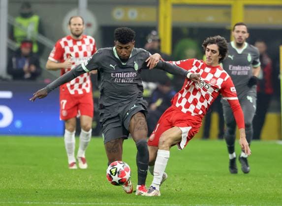 January 22, 2025, Como, ITALY: AC Milans Emerson Royal (L) challenges for the ball with Gironas Bryan Gil during the UEFA Champions League soccer match between Milan and Girona at Giuseppe Meazza stadium in Milan, 22 January 2025..ANSA MATTEO BAZZI Soccer; UEFA Champions League: Milan vs Girona  - ZUMAa110 20250122_zaf_a110_013 Copyright: xMatteoxBazzix
