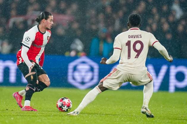 2025-01-22 Feyenoord v FC Bayern Munchen - Champions League - League phase - Matchday 7 ROTTERDAM, NETHERLANDS - JANUARY 22: Anis Hadj Moussa of Feyenoord is challenged by Alphonso Davies of Bayern Munchen during the Champions League - League phase - Matchday 7 match between Feyenoord and FC Bayern Munchen at Stadion Feijenoord on January 22, 2025 in Rotterdam, Netherlands. Rotterdam Stadion Feijenoord Netherlands Content not available for redistribution in The Netherlands directly or indirectly through any third parties. Copyright: xJorisxVerwijstx