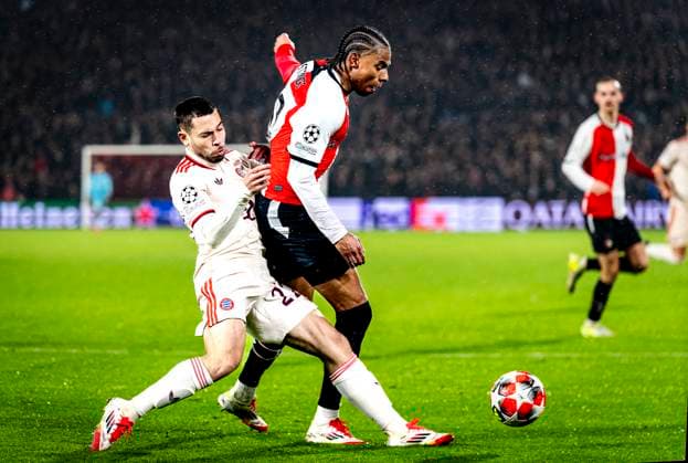 SC Bayern Munchen defender Raphael Guerreiro, Feyenoord Rotterdam midfielder Calvin Stengs during the match Feyenoord - Bayern Munchen at the Stadium De Kuip for the UEFA Champions League - League Phase - Matchday 7 season 2024-2025 in ROTTERDAM, Netherlands on 22 january 2025, (photo by Marcel van Dorst EYE4images DeFodi Images) Defodi-746_209879