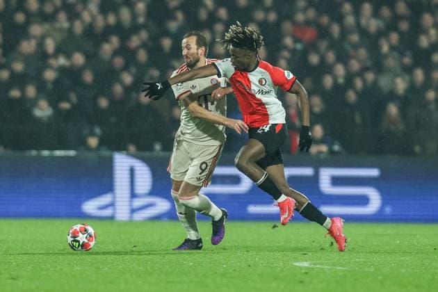 Fussball, UEFA Champions League Saison 2024 2025 Ligaphase 7.Spieltag Feyenoord Rotterdam - FC Bayern München 22.01.2025, Stadion Feijenoord De Kuip Harry Kane (FC Bayern München, 9) Chris-Kevin Nadje (Feyenoord Rotterdam, 34) Rotterdam Stadion Feijenoord - De Kuip Niederlande