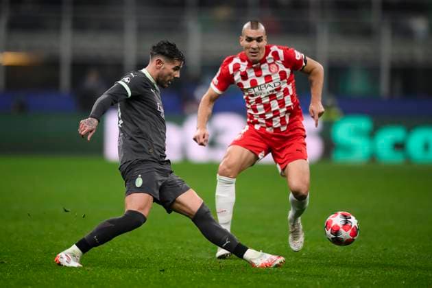 AC Milan v Girona FC - UEFA Champion League Theo Hernandez of AC Milan is challenged by Oriol Romeu of Girona FC during the UEFA Champions League 2024 25 league phase football match between AC Milan and Girona FC. Milan Italy Copyright: xNicolòxCampox