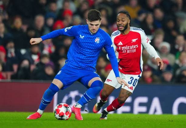 Martin Baturina of Dinamo Zagreb and Raheem Sterling of Arsenal Arsenal v Dinamo Zagreb, UEFA Champions League, Group Stage, Football, Emirates Stadium, London, UK - 22 Jan 2025 EDITORIAL USE ONLY No use with unauthorised audio, video, data, fixture lists, club league logos or live services. Online in-match use limited to 120 images, no video emulation. No use in betting, games or single club league player publications.  Copyright: xJavierxGarcia Shutterstockx 15108893cb