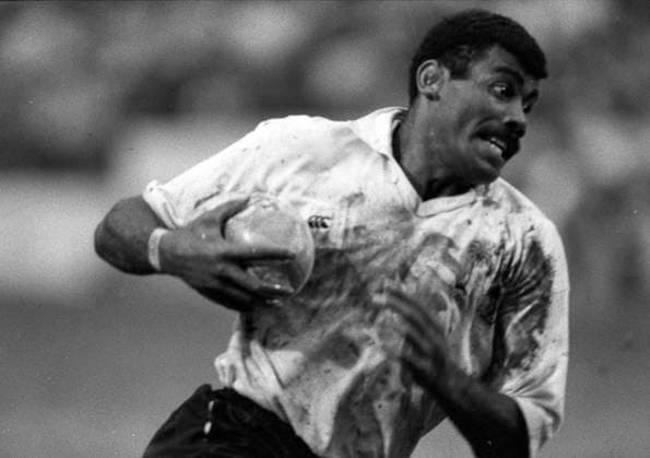 Hat-trick hero ... giant Fijian forward Mesake Rasari destroyed the All Blacks with a three-try haul in the Cup final in quagmire conditions at the Cathay Pacific Hongkong Bank Invitation Sevens in Hong Kong Stadium. Fiji overwhelmed the New Zealanders 22-6. 06APR92 Hong Kong Hong Kong EDITORIAL USE ONLY  Copyright: xx MER1502161336406675 MarkxRoundx 0795502101st