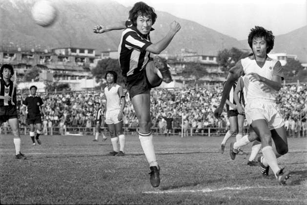 Players in action during a league game of USD (stripe) against Happy Valley at the Police Ground Stadium. Happy Valley won 2-0. 04NOV77 Hong Kong Hong Kong EDITORIAL USE ONLY  Copyright: xx MER2016080302181065 SamxChanx 0795693759st