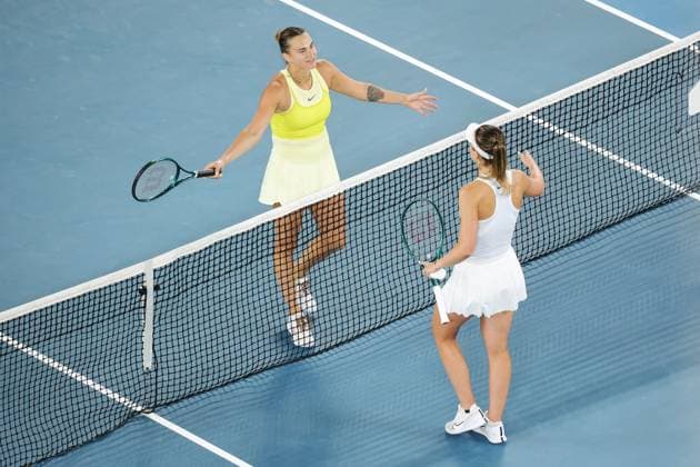 Aryna Sabalenka hugs Paula Badosa at the net after winning their semi-final match in the Rod Laver Arena Australian Open, Day Twelve, Tennis, Melbourne Park, Melbourne, Australia - 23 Jan 2025  Copyright: xRachelxBach Shutterstockx 15108799cc