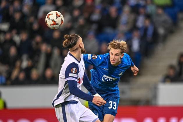 Radu Dragusin (Tottenham Hotspur) und Max Moerstedt (TSG 1899 Hoffenheim) battle for the ball during the UEFA Europa League 2024 25 League Phase MD7 match between TSG 1899 Hoffenheim v Tottenham Hotspur at PreZero Arena on January 23, 2025 in Hoffenheim, Germany. (Photo by Harry Langer DeFodi Images) Defodi-541_TSGTOT20250123_76