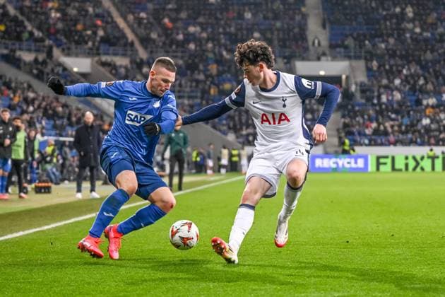 Pavel Kaderabek (TSG 1899 Hoffenheim) und Archie Gray (Tottenham Hotspur) battle for the ball during the UEFA Europa League 2024 25 League Phase MD7 match between TSG 1899 Hoffenheim v Tottenham Hotspur at PreZero Arena on January 23, 2025 in Hoffenheim, Germany. (Photo by Harry Langer DeFodi Images) Defodi-541_TSGTOT20250123_80