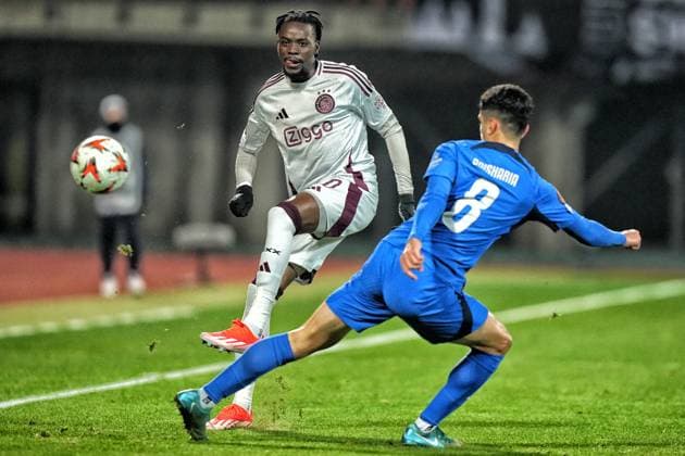 RIGA, 23-01-2025 , Daugava Stadium , football, UEFA Europa League, season 2024 2025, Match between RFS and Ajax. Ajax player Bertrand Traore and RFS player Lasha Odisharia RFS - Ajax  x27527645x Copyright: