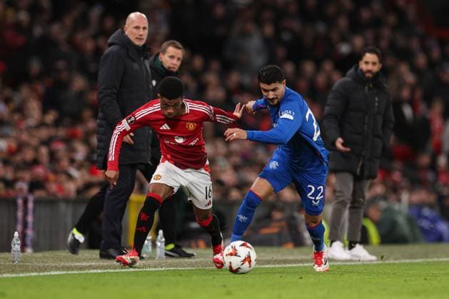 Amad Diallo of Manchester United, ManU battles with Jeftà of Rangers Manchester United v Rangers, UEFA Europa League, Group Stage, Football, Old Trafford, Manchester, UK - 23 Jan 2025 EDITORIAL USE ONLY No use with unauthorised audio, video, data, fixture lists, club league logos or live services. Online in-match use limited to 120 images, no video emulation. No use in betting, games or single club league player publications. Copyright: xPaulxCurrie Shutterstockx 15108899x