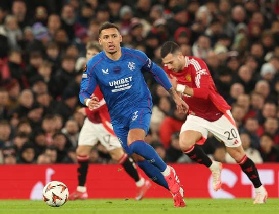 Rangers captain James Tavernier on the ball during the Europa League group phase match at Old Trafford, Manchester. Manchester United, ManU v Rangers, UEFA Europa League, Group Stage, Football, Old Trafford, Manchester, UK - 23 Jan 2025 EDITORIAL USE ONLY No use with unauthorised audio, video, data, fixture lists, club league logos or live services. Online in-match use limited to 120 images, no video emulation. No use in betting, games or single club league player publications. Copyright: xRangersxFC Shutterstockx 15111693dk