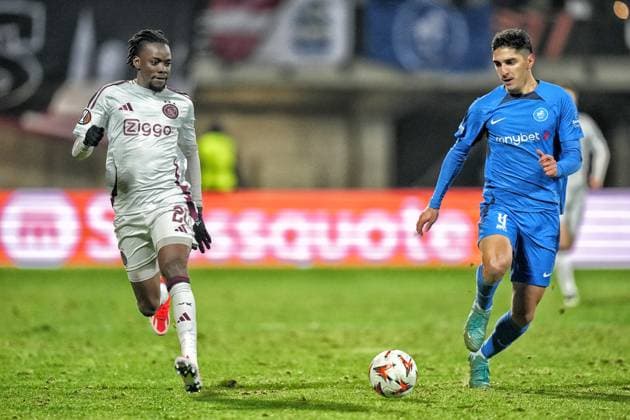 RIGA, 23-01-2025 , Daugava Stadium , football, UEFA Europa League, season 2024 2025, Match between RFS and Ajax. Ajax player Bertrand Traore and RFS player Lasha Odisharia RFS - Ajax  x27527871x Copyright: