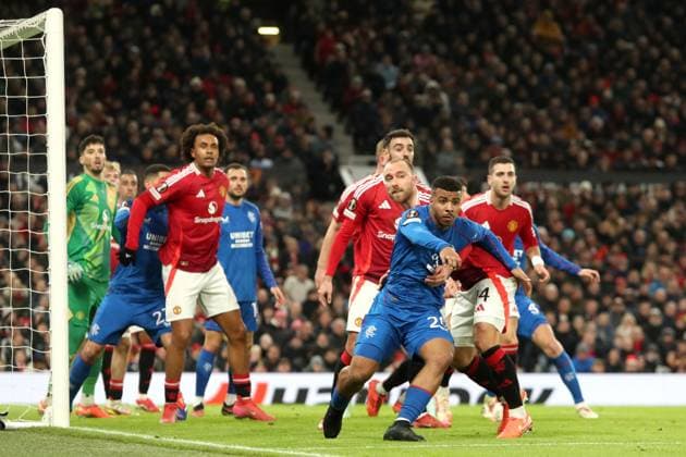 Christian Erikson of Manchester United, ManU holds Hamza Igamane of Rangers during the Europa League group phase match at Old Trafford, Manchester. Manchester United v Rangers, UEFA Europa League, Group Stage, Football, Old Trafford, Manchester, UK - 23 Jan 2025 EDITORIAL USE ONLY No use with unauthorised audio, video, data, fixture lists, club league logos or live services. Online in-match use limited to 120 images, no video emulation. No use in betting, games or single club league player publications. Copyright: xRangersxFC Shutterstockx 15111693ft