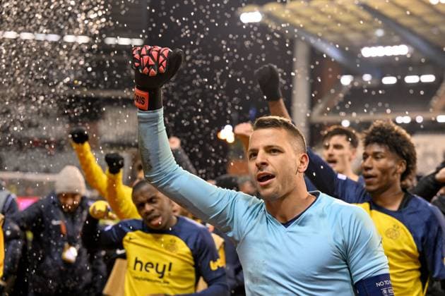 250123 Royale Union Saint-Gilloise vs SC Braga players of Union with Goalkeeper Anthony Moris (49) of Union celebrate after winning the league phase - matchday 7 game in the Uefa Europa League season 2024-2025 between Royale Union Saint-Gilloise and SC Braga from Portugal on January 23 , 2025 in Brussel, Belgium. (Photo by David Catry Isosport) Brussel Belgium  Copyright: xDavidxCatryx 20250123DC1_3253