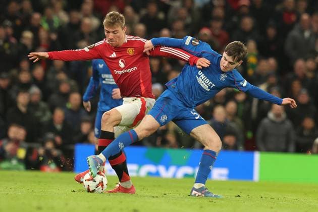 Rasmus Hojlund of Manchester United, ManU and Findlay Curtis of Rangers during the Europa League group phase match at Old Trafford, Manchester. Manchester United v Rangers, UEFA Europa League, Group Stage, Football, Old Trafford, Manchester, UK - 23 Jan 2025 EDITORIAL USE ONLY No use with unauthorised audio, video, data, fixture lists, club league logos or live services. Online in-match use limited to 120 images, no video emulation. No use in betting, games or single club league player publications.  Copyright: xRangersxFC Shutterstockx 15111693md