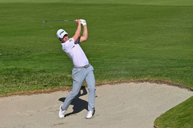 January 23, 2025: Maverick McNealy hits a shot from a bunker on the 9th hole during the second round of the Farmers Insurance Open on Torrey Pines South Course in San Diego, California. CSM San Diego USA - ZUMAc04_ 20250123_zma_c04_064 Copyright: xJustinxFinex