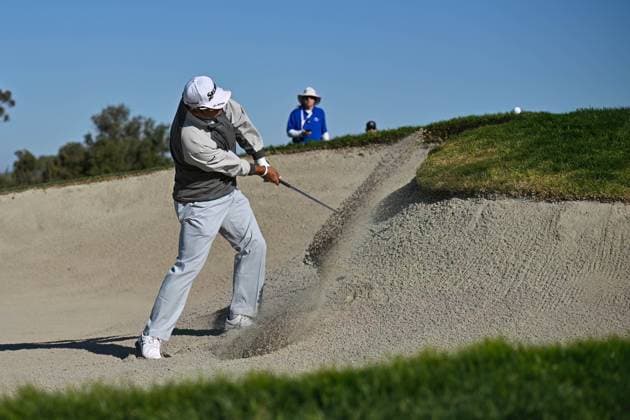 January 23, 2025: San Diego, California, USA: HIDEKI MATSUYAMA hits a bunker shot on the 11th hole during the second round of the Farmers Insurance Open on Torrey Pines North Course in San Diego. San Diego USA - ZUMAc04_ 20250123_zma_c04_013 Copyright: xJustinxFinex